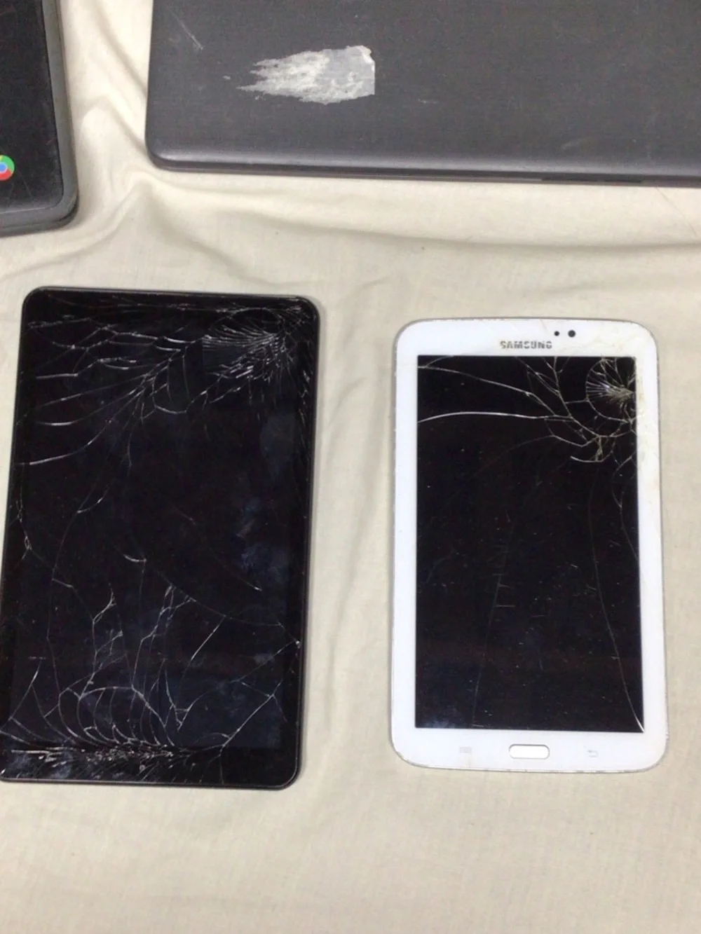Samsung White Tablet with Visible Cracked Screen. Computer parts lot , parts lot